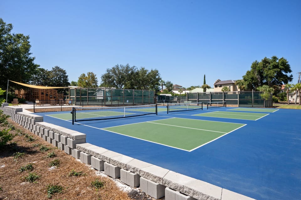 Hidden Dunes Resort Amenities – tennis/pickleball, basketball, shuffleboard, horseshoes, playground, scenic walking trails, and a catch-and-release fishing lake