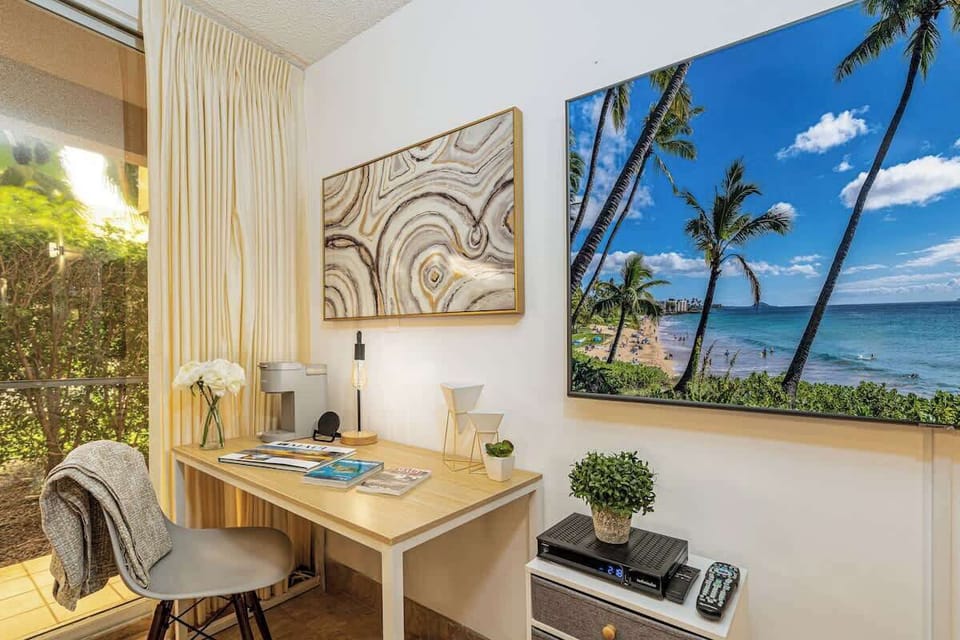 Work or relax in our cozy nook with garden views and modern amenities, perfect for your stay.