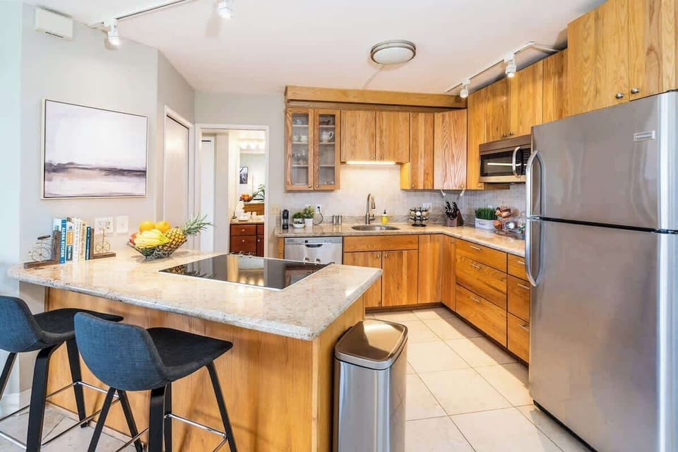 Cook in our fully equipped kitchen with modern appliances at 'The Maui Banyan' resort.