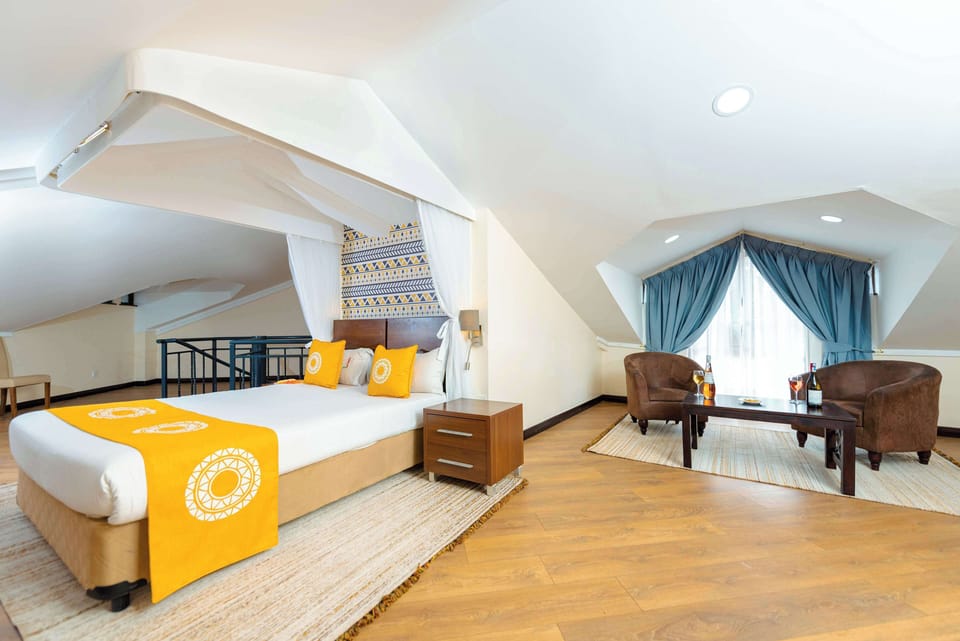 Premium bedding, down comforters, pillowtop beds, in-room safe