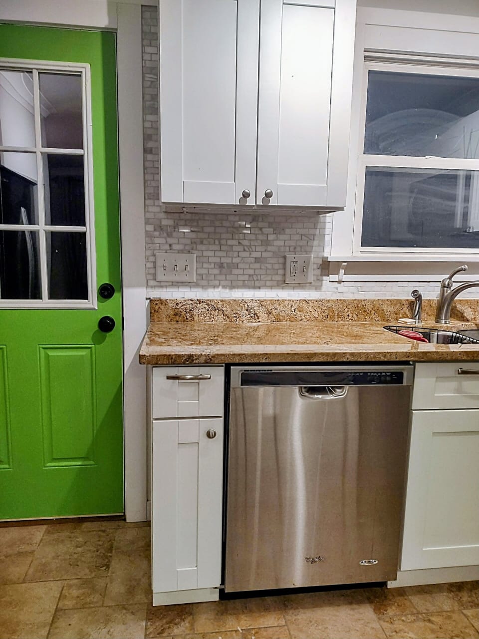 WHIRLPOOL DISHWASHER beside door to deck (and outside dining area)