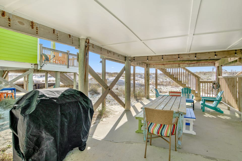 Gas grill under the home