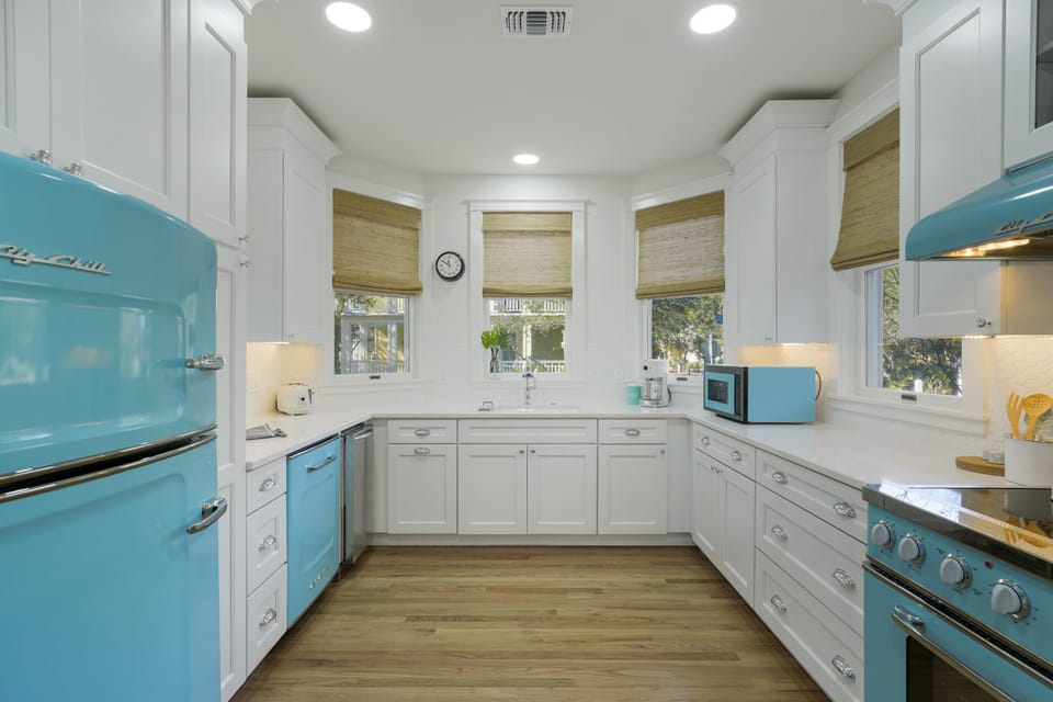 KITCHEN W/RETRO APPLIANCES, QUARTZ COUNTERS, & CUSTOM CABINETS