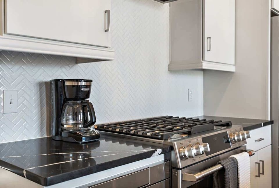 Your home-cooked meals and morning coffee are covered with a stove and coffee maker.