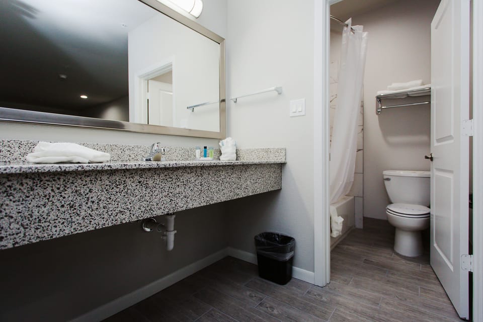 Combined shower/tub, towels, soap, shampoo