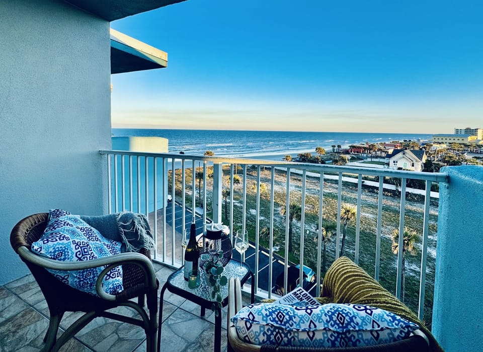 A room with a view!  Grab the outdoor pillows & blankets to relax on the balcony