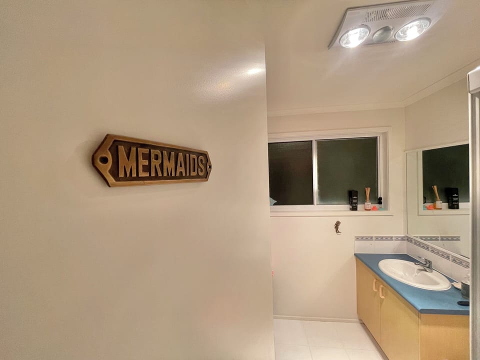 Main bathroom – clean, practical and well lit