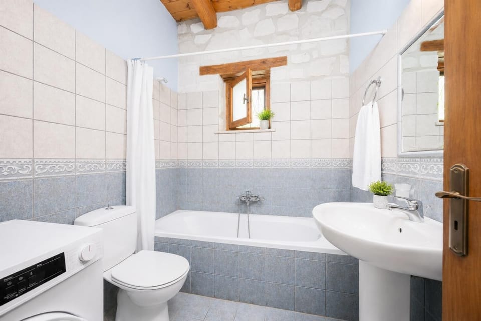 Family bathroom with bath and shower