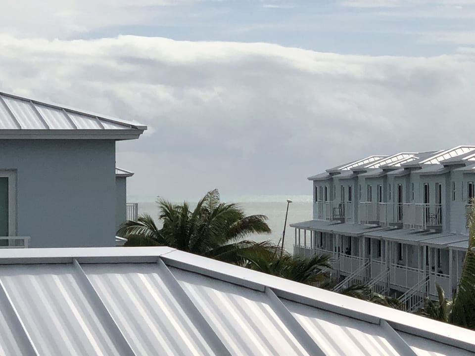 Our view from the first bedroom upstairs.  We zoomed but you can see the water!