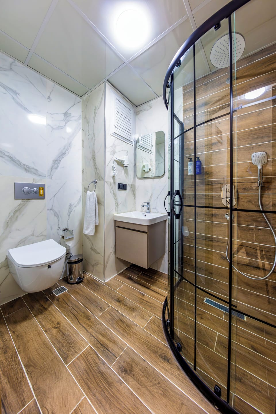 Shower, free toiletries, hair dryer, slippers
