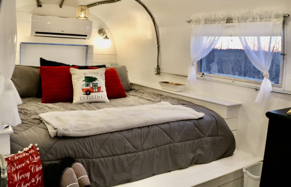 California King size bed with a mini split heat pump for the perfect temp.