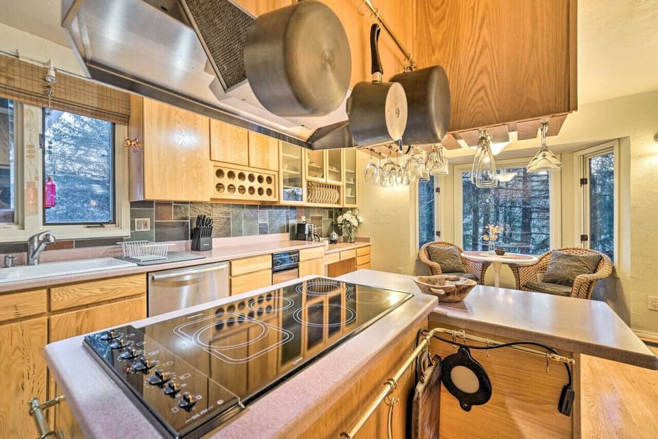 Fully stocked kitchen, dishwasher and trash compactor.