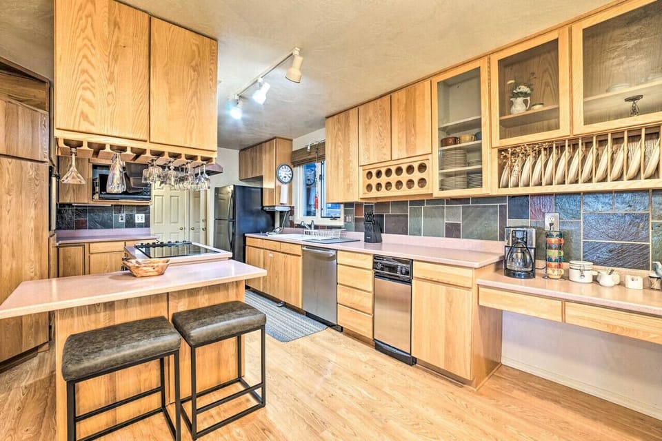 Fully stocked kitchen, dishwasher and trash compactor.