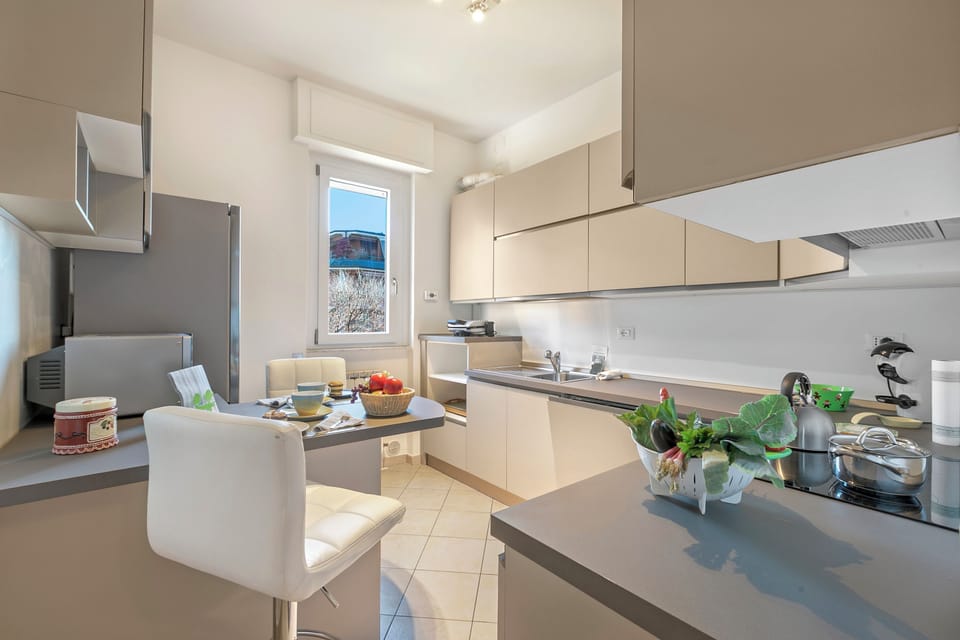 Family Apartment, Multiple Bedrooms (Alelù Classy And Chic Stresa Center) | Private kitchen | Fridge, microwave, oven, stovetop