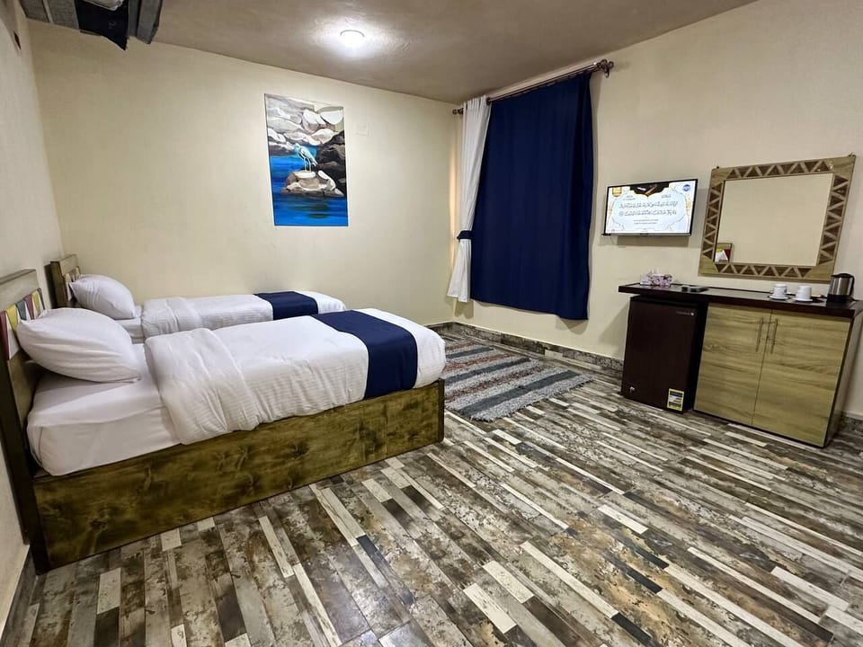 Premium bedding, down comforters, Select Comfort beds, free minibar
