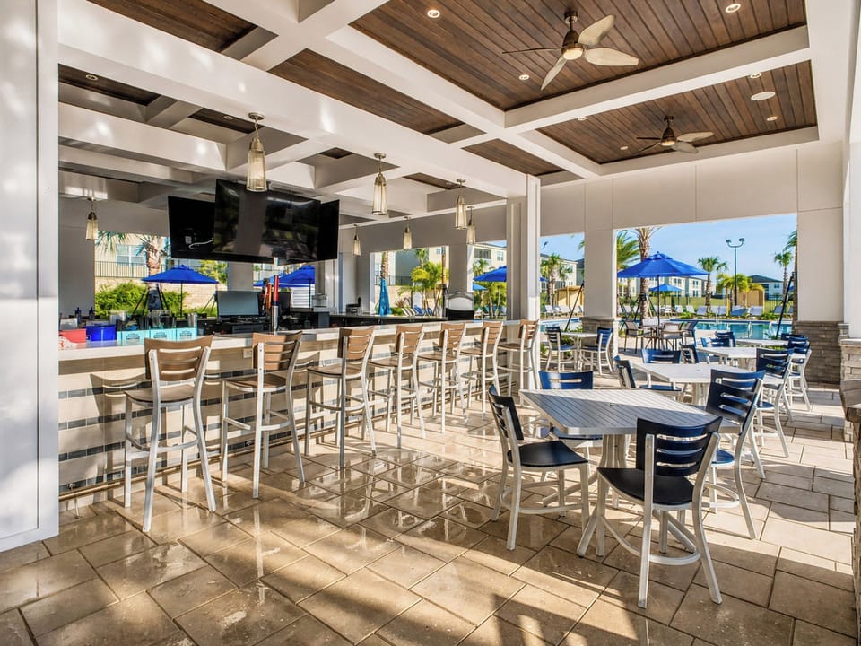 Covered Poolside Bar and Outdoor Resort Dining Area