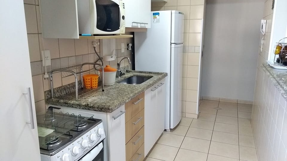 Apartment | Private kitchen | Fridge, microwave, cookware/dishes/utensils, dining tables