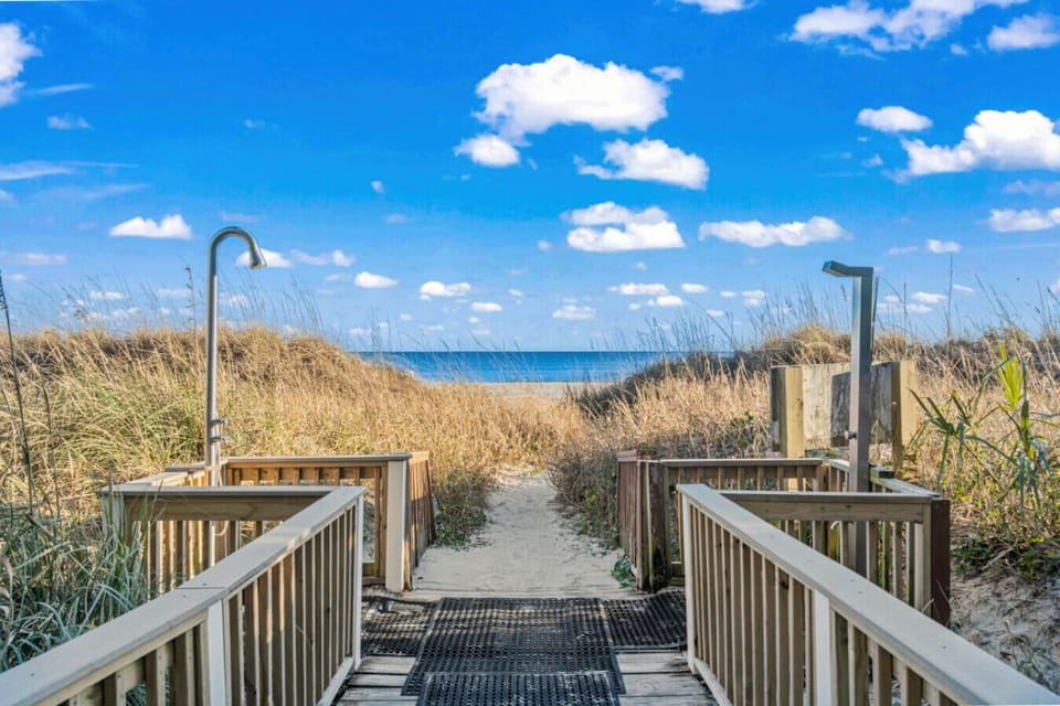 Direct Beach Access and outdoor showers for rinsing off after a long day or short walk on the beach.
