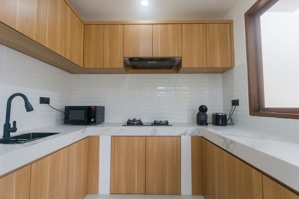 Exclusive Villa | Private kitchen | Fridge, microwave, stovetop, electric kettle