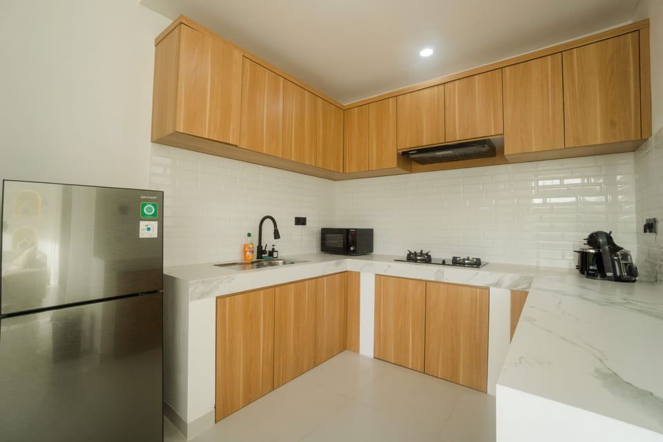 Exclusive Villa | Private kitchen | Fridge, microwave, stovetop, electric kettle
