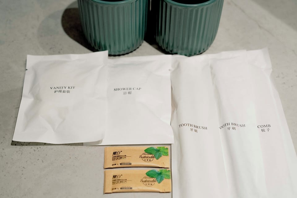 Designer toiletries, hair dryer, bathrobes, slippers
