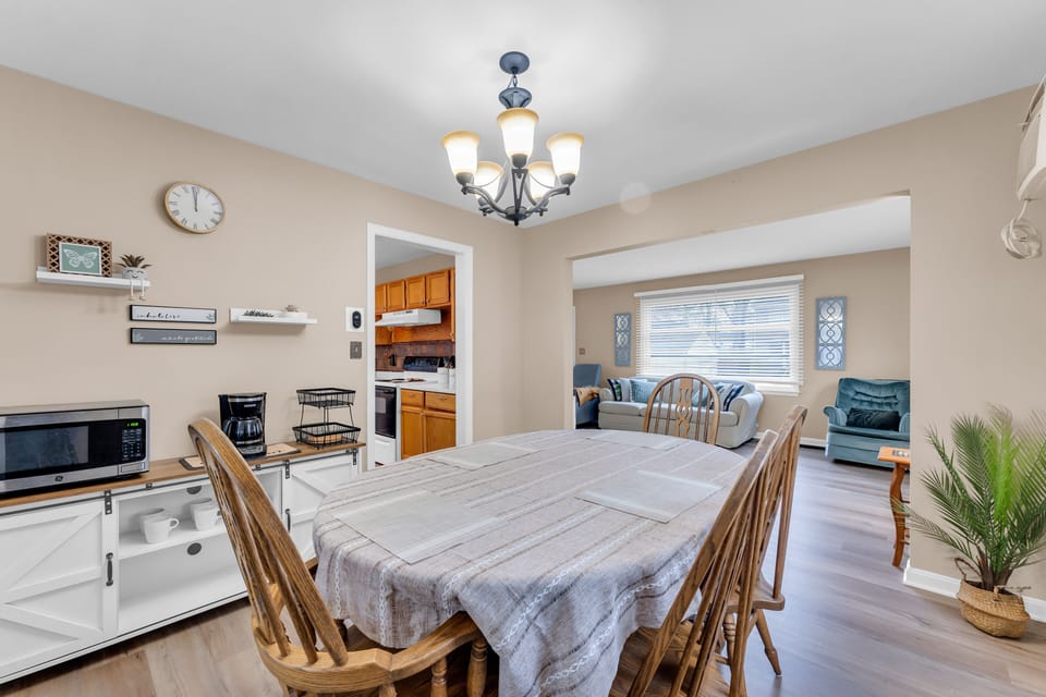 Dining room with table that can accommodate 6 people to share a meal with