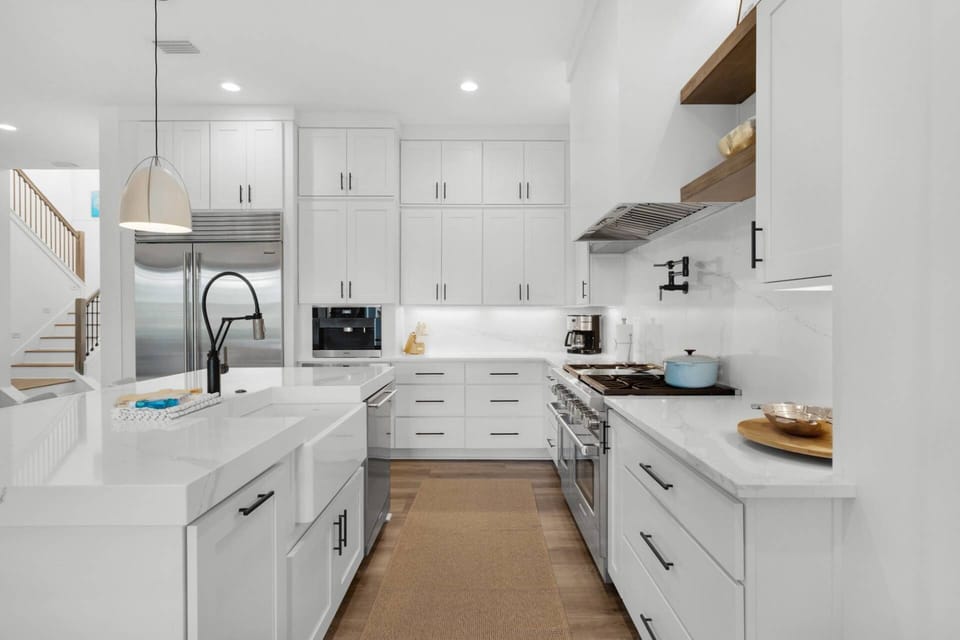 Gorgeous well appointed kitchen is a chefs dream, featuring a Wolf Range, Sub-Zero refrigeration, Cove Dishwasher, Sub-Zero beverage center, ice machi