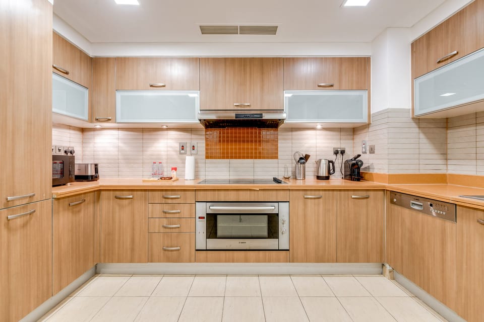 Luxury Townhome, 3 Bedrooms, Sea View | Private kitchen | Coffee/tea maker, full-size fridge, microwave, oven