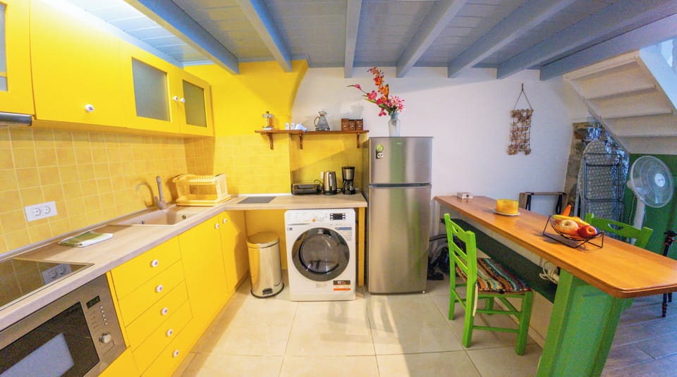 Apartment | Private kitchen | Coffee/tea maker, full-size fridge, microwave, oven