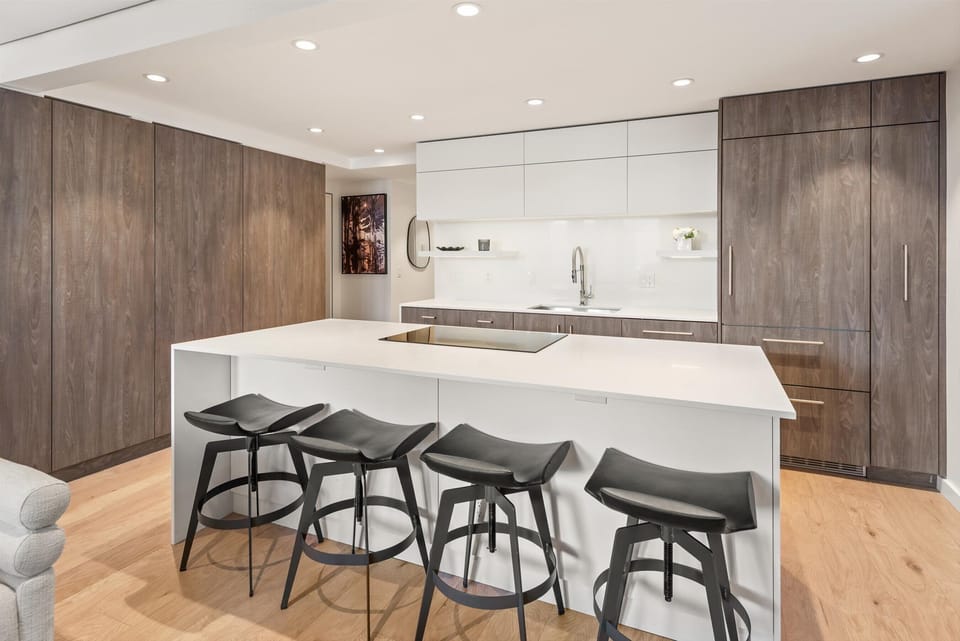 Updated kitchen complete with seating for four and high end appliances