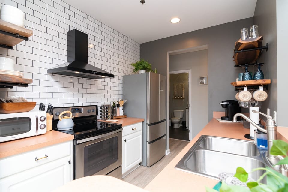 Making meals is easy in our spacious galley kitchen.  Spices and oils included.