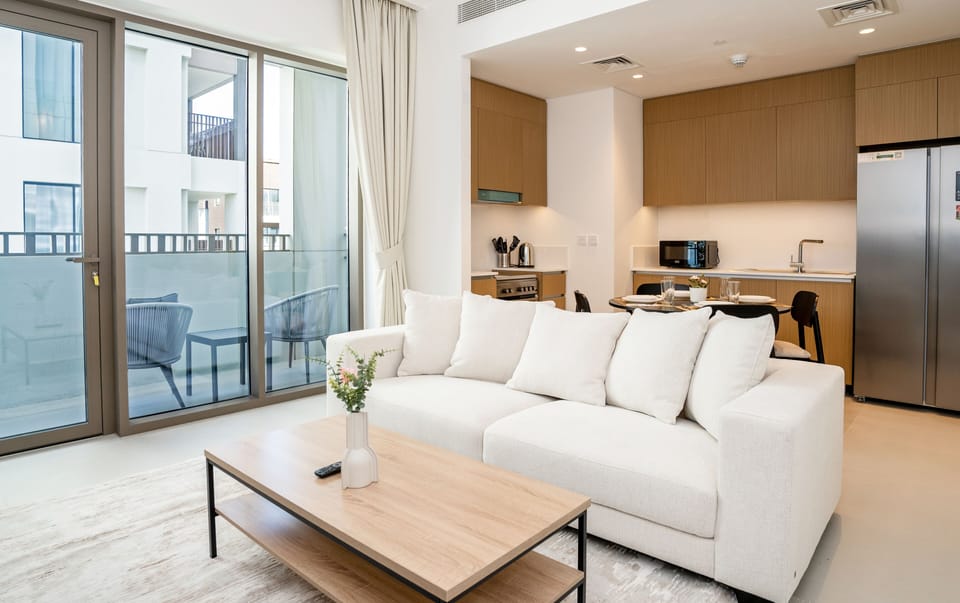 Deluxe Apartment | Living area | 55-inch Smart TV with digital channels