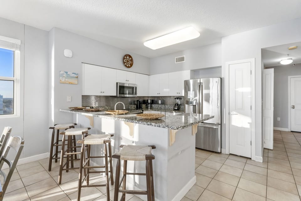Modern kitchen with granite countertops and stainless steel appliances