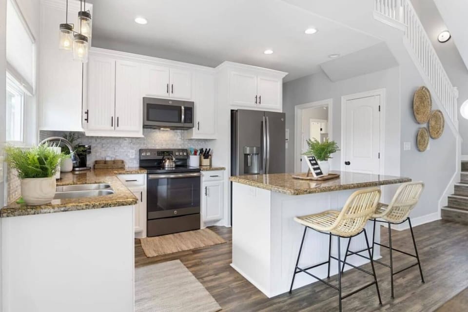 A well-lit kitchen space where function and design harmonize to create the heart of the home.