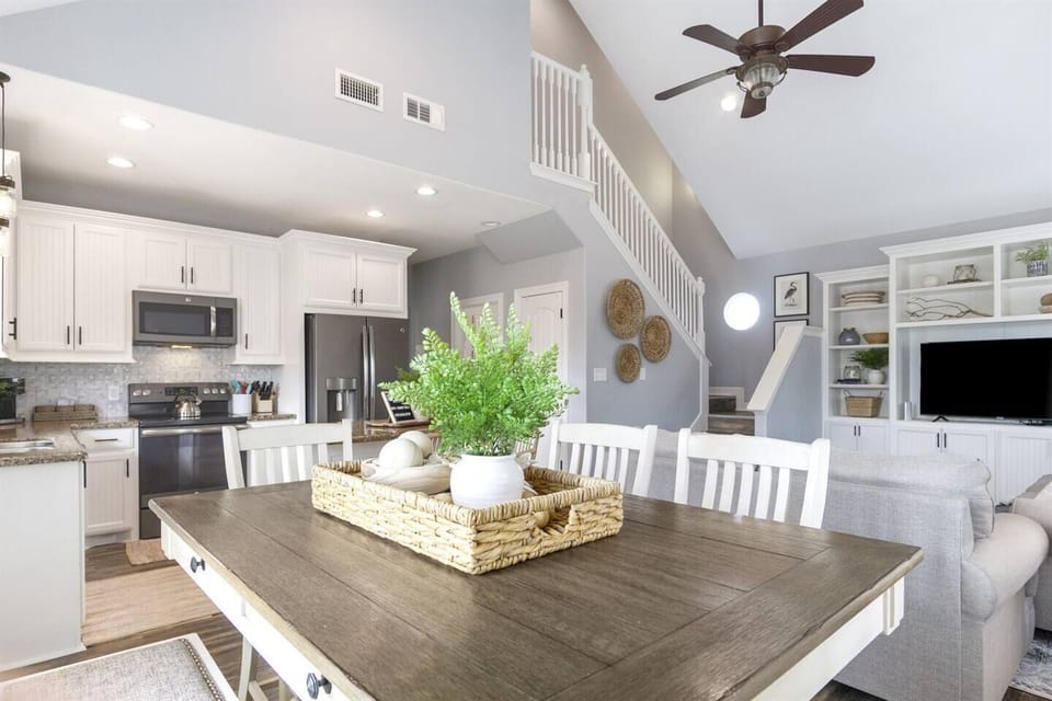 A harmonious blend of modern kitchen convenience and inviting living space, perfect for family moments and entertaining friends.