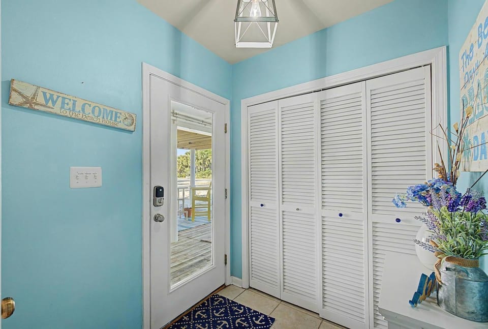 Closet off the entry way provides storage space for items you don't want to leave outside