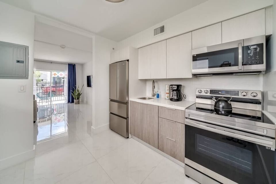 Enjoy a full kitchen nicely equipped with cooking essentials 