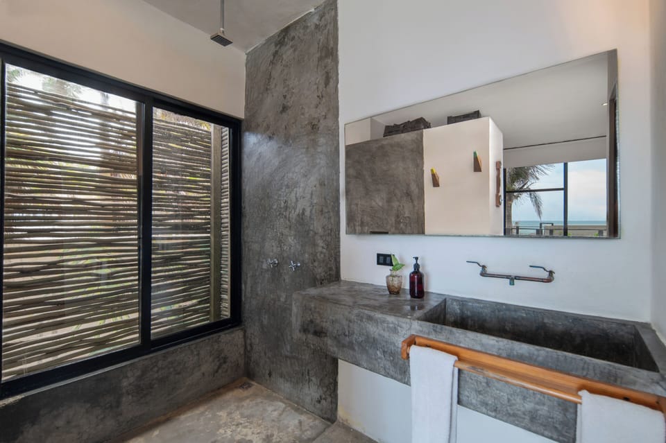 Shower, rainfall showerhead, hair dryer, towels