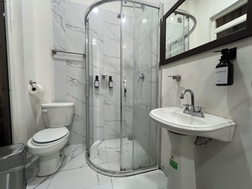 Signature Twin Room, Multiple Beds | Bathroom | Shower, free toiletries, towels, soap