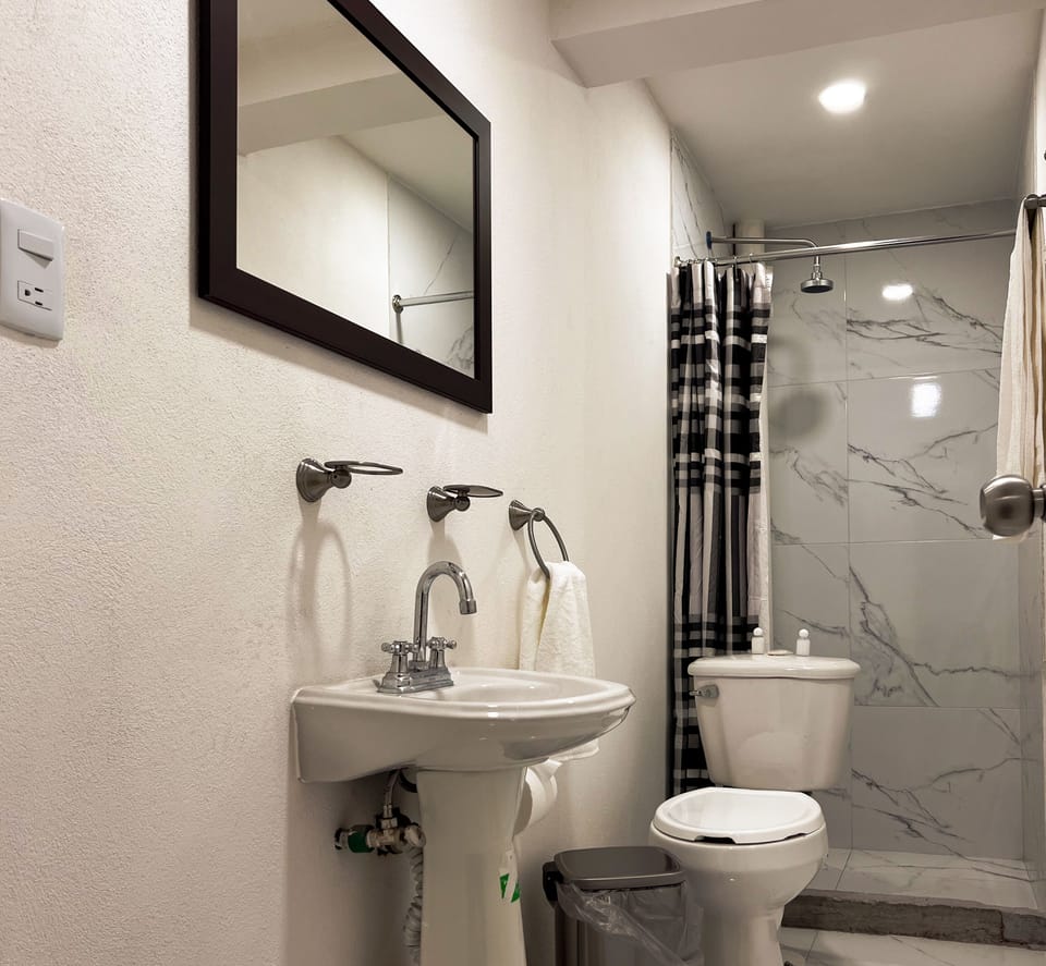 Shower, free toiletries, towels, soap