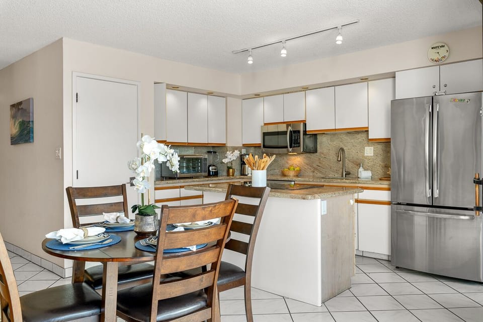 Tile flooring in the kitchen and dining area