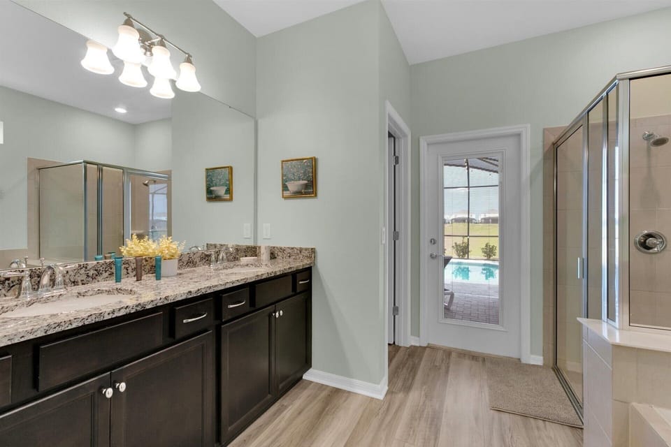 Master Suite 1, Shower and Tub, Downstairs, Door to Pool Deck