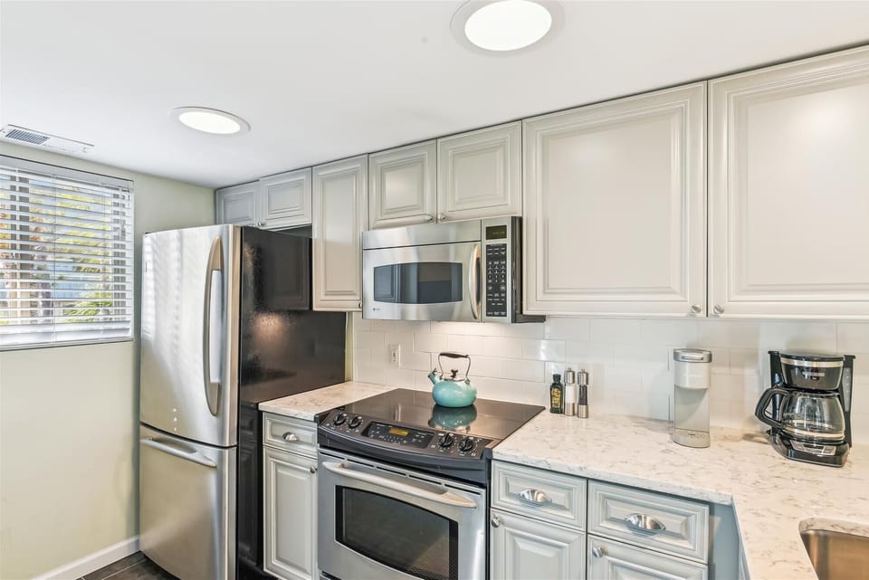 The kitchen is fully equipped for meal preparation, enhancing the feel of a home away from home.