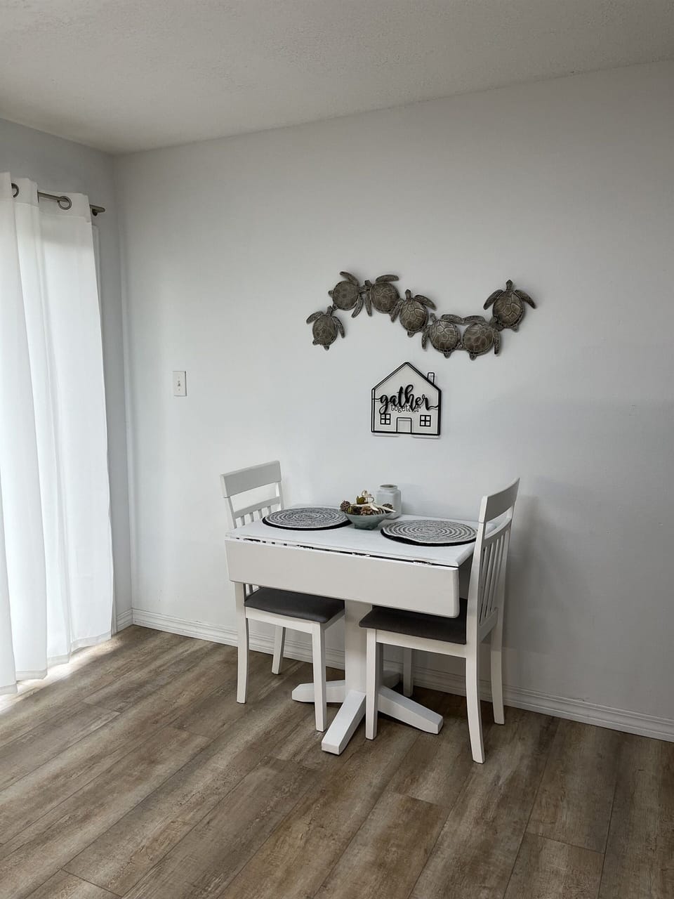 dining table.  Seats four with additionalchairs in closet