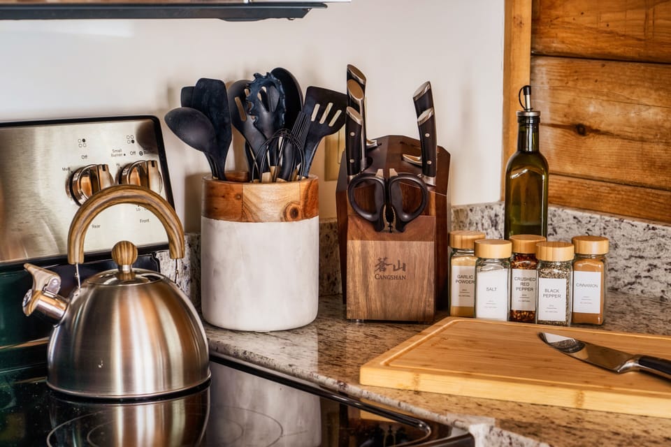 Fully stocked kitchen with chef's knife set, perfect for cooking delicious meals