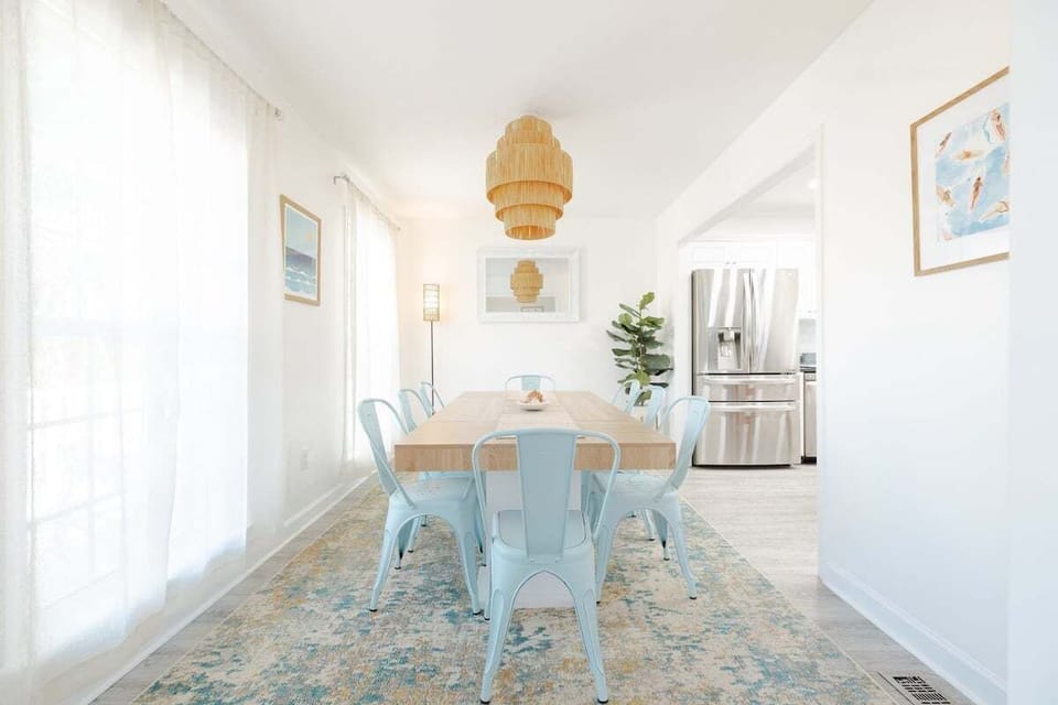 Open‑concept dining area designed for family meals, game nights, and coastal‑inspired gatherings.