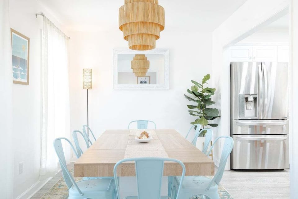 Open‑concept dining area designed for family meals, game nights, and coastal‑inspired gatherings.