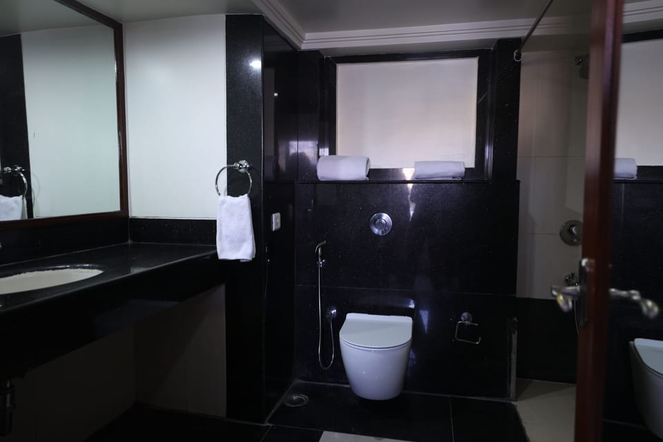 Premium Room | Bathroom | Shower, hair dryer, towels, soap
