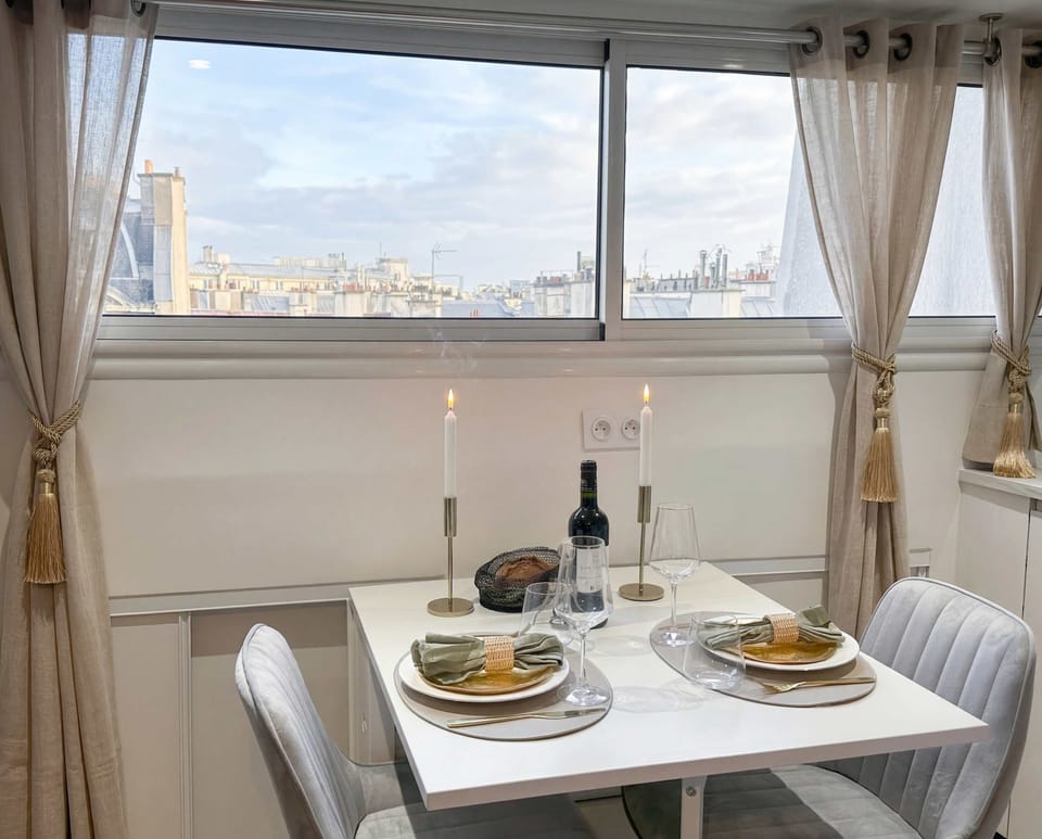 Cosy dining setup in the living room, providing an elegant space for two persons