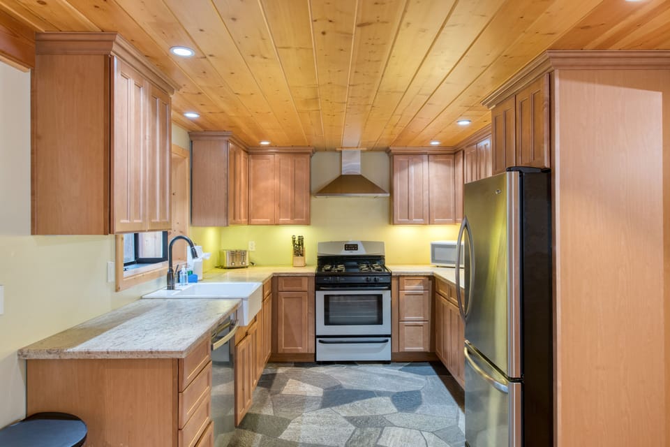 Fully-equipped kitchen features modern appliances and everything you need to prepare at-home meals and snacks.